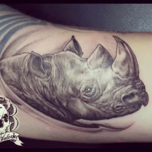 Rhino tattoo black and grey by Brian Blalock