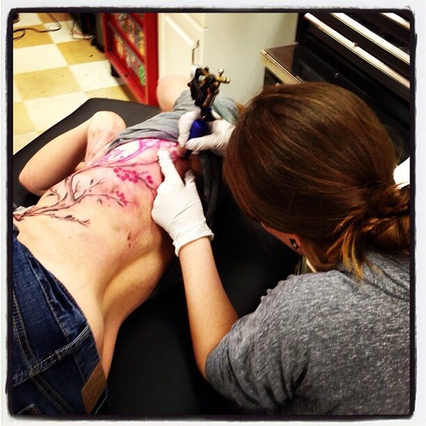 Jen tattooing Cherry blossom