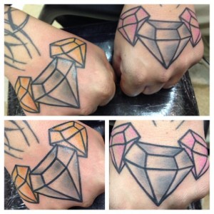 Hand tattoo by Jen