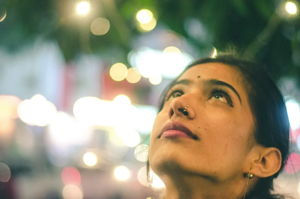 photo - a woman wondering why do women pierce their nose