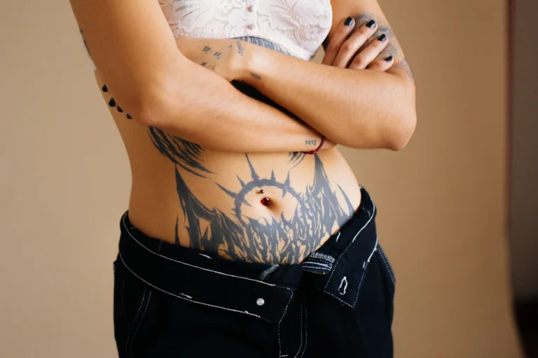 photo - a huge tummy tuck camouflage tattoo