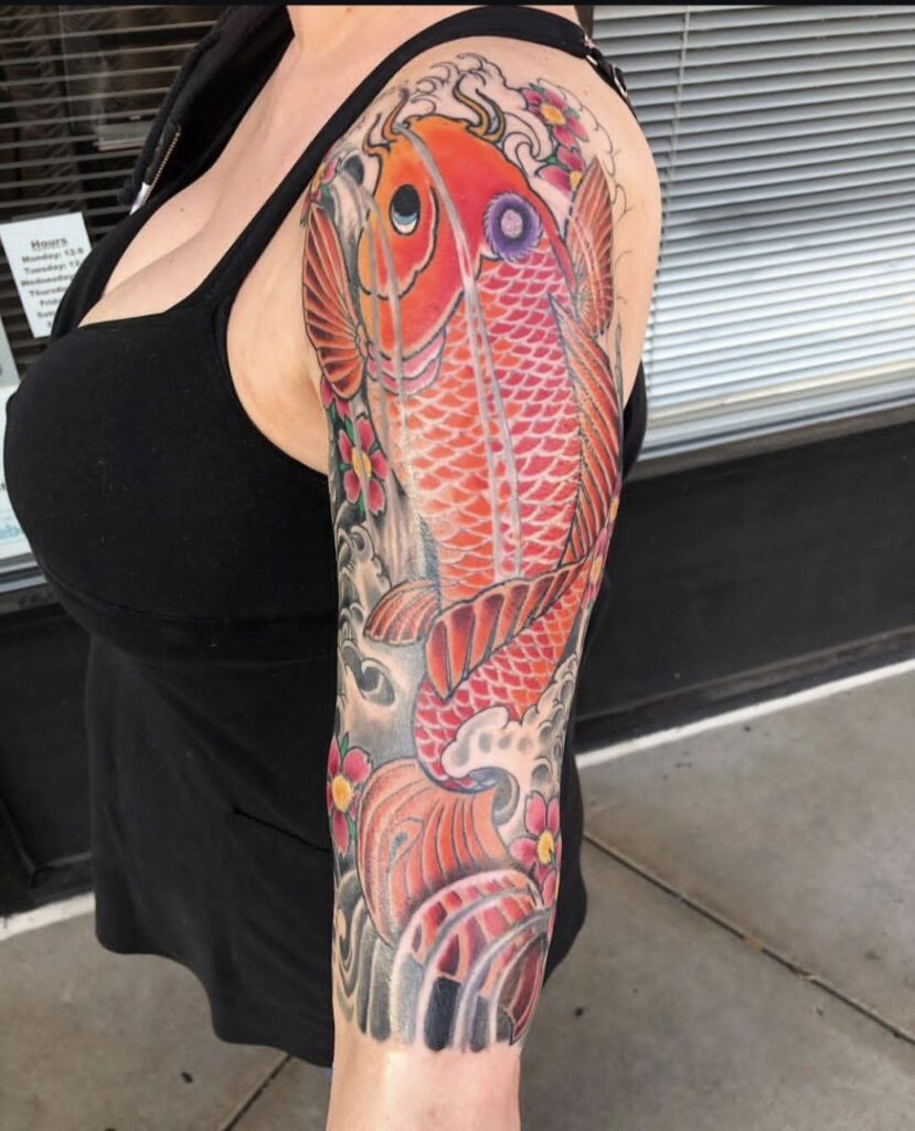 Geometric pattern tattoo on an arm by Mantra Tattoo and Piercing