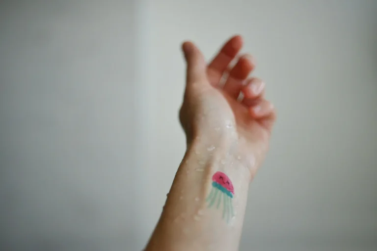 photo - small watercolor tattoo on wrist