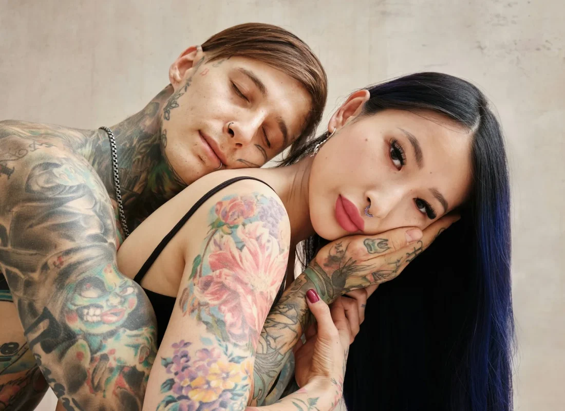 skilled tattoo artist creating custom tattoo in Denver CO studio